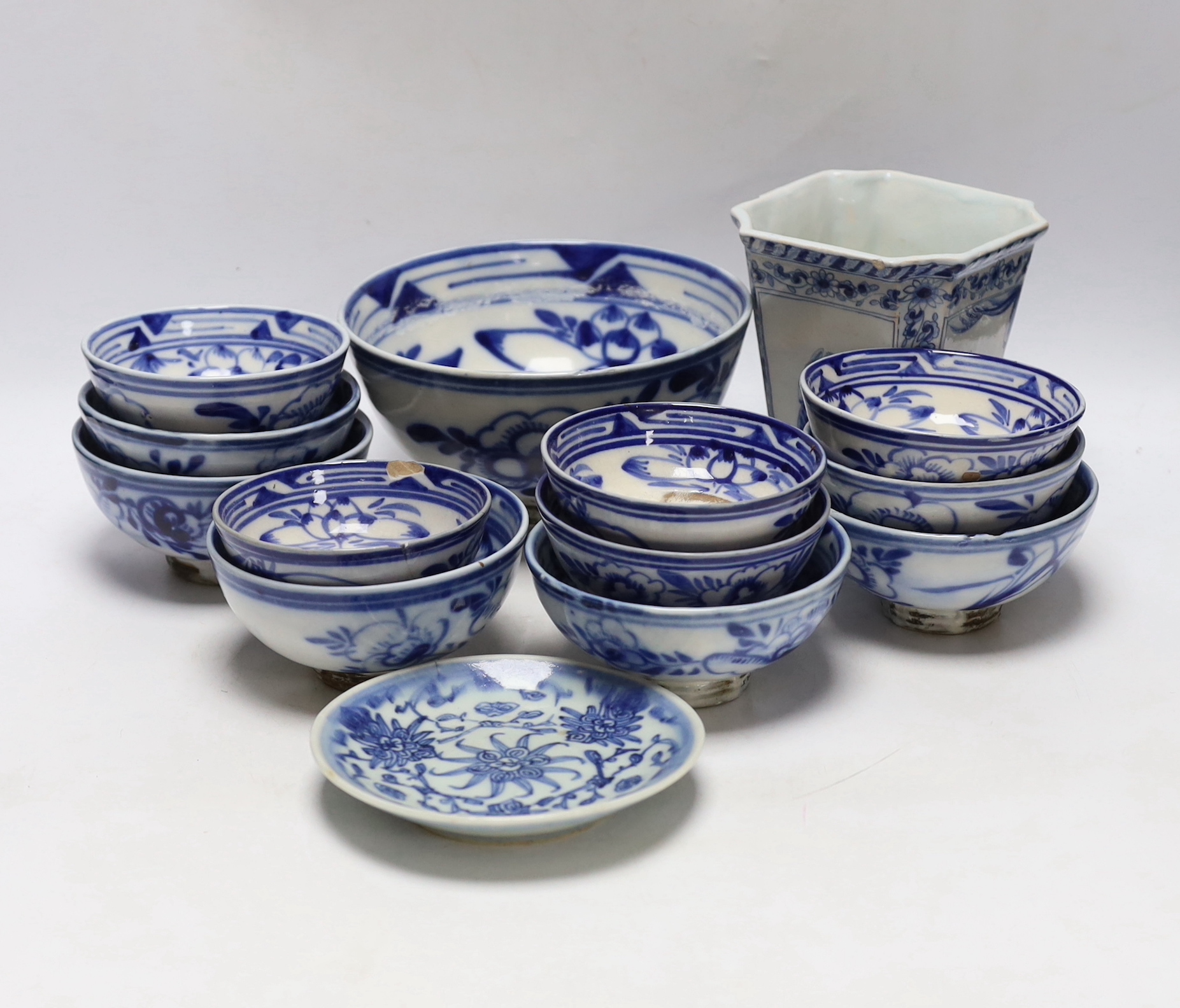 A group of Chinese blue and white bowls a dish and a Delft blue and white vase, largest 19cm in diameter